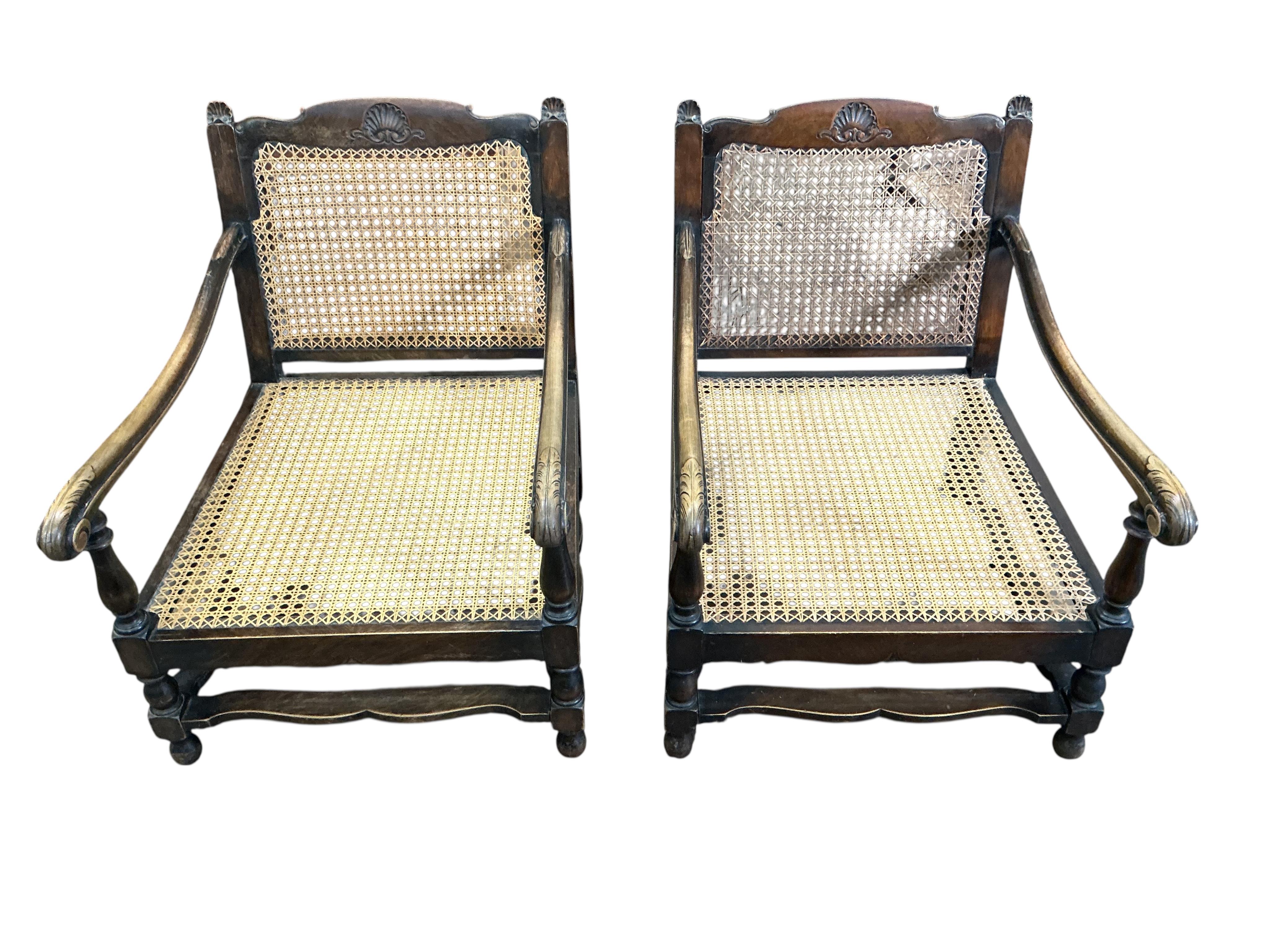 An early 20th century mahogany three piece bergere suite, settee width 174cm, height 74cm